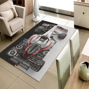 May include: A rectangular area rug featuring a Formula 1 race car design. The rug has a black and white background with a detailed illustration of the car in red, white, and black. The rug's design includes technical schematics and data displays.