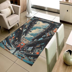 May include: Rectangular area rug with a futuristic city scene, featuring a perspective view of buildings, sky, and clouds. The rug has a dark color palette with blue, orange, and gray tones. The design creates an illusion of depth and a sense of urban landscape.