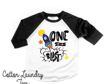 One is a Blast Birthday shirt - 1st Birthday Space Shirt - Space Theme - Unisex Kids' Shirts - ONE year Old - Rocket ship 1st birthday shirt