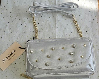 silver Juicy Couture crossbody purse.