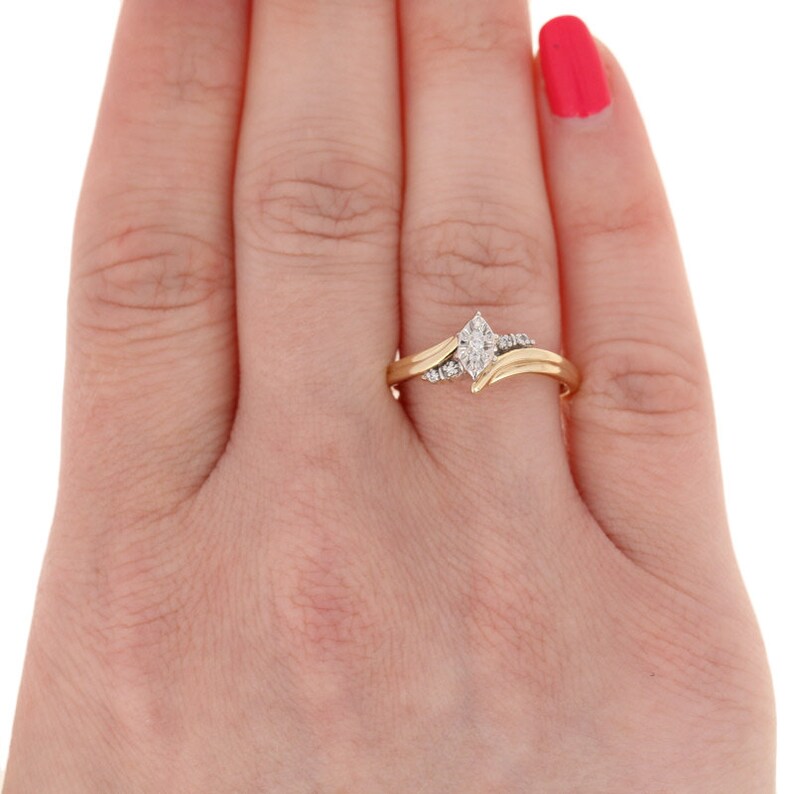 10k Gold Illusion Solitaire Bypass Round Brilliant Diamond Engagement Ring