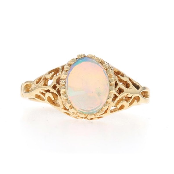 Anillo solitario de ópalo australiano en oro amarillo - Cabujón ovalado de 0,80 quilates (10k)