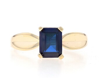 Yellow Gold Lab-Created Sapphire Solitaire Ring - 10k Emerald Cut 1.75ct