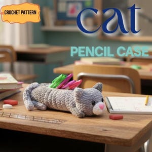 May include: A gray crocheted cat-shaped pencil case with a pink nose and green and pink pens inside. The text "Cat PENCIL CASE" is displayed above the pencil case. The words "CROCHET PATTERN" are in a yellow banner.