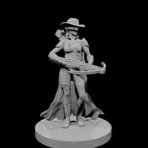 May include: A gray unpainted miniature figurine of an elf archer wearing a wide-brimmed hat, shoulder armor, and a long coat. The figure holds a crossbow in both hands and carries a quiver of arrows on the back, standing on a circular base.