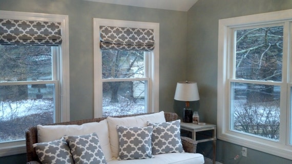 Premier prints Fynn in Ash Grey Flat Roman priced per square foot fabric not included