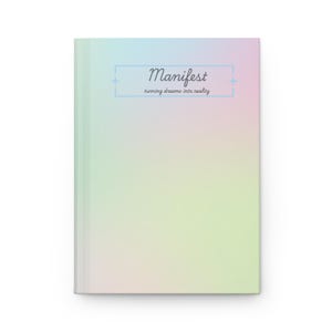 May include: A hardcover journal with a pastel gradient cover in shades of blue, pink, and green. The word "Manifest" is written in cursive script within a light blue rectangle, with the phrase "turning dreams into reality" below.