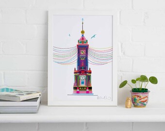 May include: A colorful illustration of a clock tower with a string of lights hanging above it. The tower is pink, purple, and blue with a white clock face. The illustration is framed in a white frame.