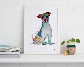 May include: A white framed print of a colorful Jack Russell terrier dog sitting. The dog is painted in a variety of colors, including blue, green, pink, and yellow. The text "Jack Russell terrier" is written in cursive on the print.