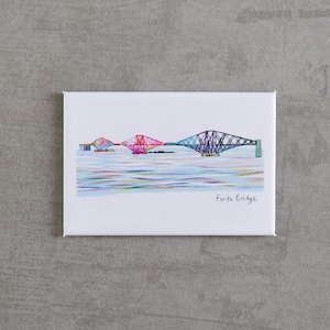May include: A rectangular canvas print featuring a colorful illustration of the Forth Bridge. The artwork depicts the bridge in shades of pink, red, blue, and green, with the words "Forth Bridge" written below.