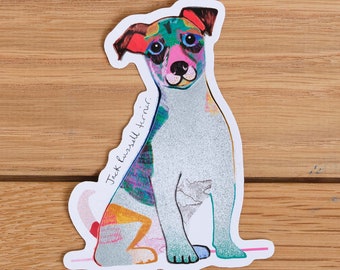 May include: A colorful sticker of a Jack Russell Terrier dog with a white background. The dog is sitting with its legs crossed and has a playful expression on its face. The text "Jack Russell Terrier" is written on the sticker.