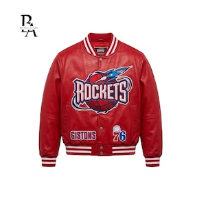 May include: A red leather jacket with white and red striped cuffs and collar. The jacket features a Rockets logo on the chest, along with the text "Gistons" and the number "76". The jacket has a button-up front.