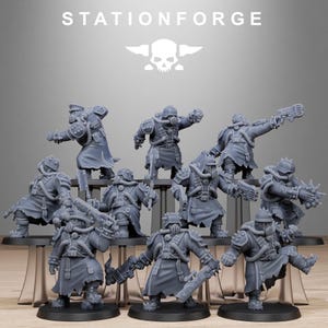 May include: A collection of gray miniature figurines of soldiers in tactical gear, including helmets, gas masks, and armor. The figurines are arranged on clear display stands. The text "STATIONFORGE" and a skull logo are visible.