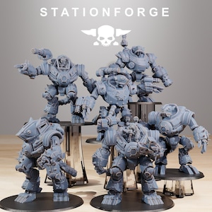 May include: A group of grey robot figurines with intricate designs, including weapons and armour, displayed on black circular stands. The image includes the text "STATIONFORGE" and a skull logo.