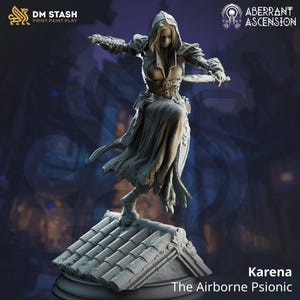 May include: A detailed figurine of a female character in a dynamic pose, wearing a hooded cloak and armour, holding a blade. The figure is standing on a tiled roof. The text "Karena The Airborne Psionic" is visible.