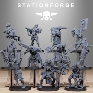 May include: A set of grey miniature figures, likely for tabletop gaming, depicting a post-apocalyptic or sci-fi theme. The figures are in dynamic poses and armed with weapons. The text "STATIONFORGE" and a skull logo are visible at the top.