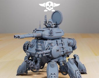 Peut inclure: Modèle gris détaillé d'un véhicule ressemblant à un char d'assaut, avec plusieurs pattes, un grand canon et une petite figurine dans une trappe. Le texte "STATIONFORGE" est au-dessus du véhicule, avec un logo de crâne et d'ailes.