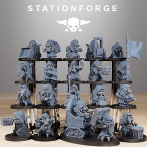 May include: A collection of gray miniature figurines, each depicting a hooded figure with various tools and equipment. The figurines are arranged on tiered black platforms. The text "STATIONFORGE" and a skull logo are at the top.
