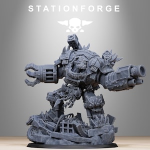 May include: A grey miniature war machine with large cannons and a claw arm, standing on a base of rubble. The text "STATIONFORGE" and a skull logo are at the top.