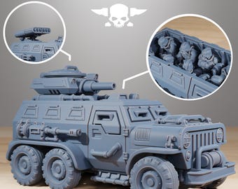 May include: A gray model of a military vehicle with a large cannon and multiple wheels. The vehicle has a detailed design, including a turret, side compartments, and a front bumper. The text "STATIONFORGE" is at the top.
