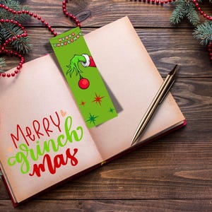 Grinch hand holding ornament Christmas bookmark, printable Merry Christmas design