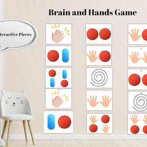 May include: A children's educational game with the text "Brain and Hands Game" and "15 Interactive Pieces". The game features various colorful shapes, hand illustrations, and spiral designs on white squares, designed for interactive play.
