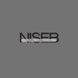 May include: A gray background with the text "NISEB" in a stylized font, with a white horizontal bar through the letters. Below the text, the words "RAP STUDIOS" are written in a smaller font.