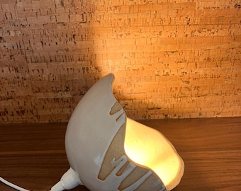 Organic portable or table lamp in handcrafted ceramic - round, wavy bedside lamp decoration