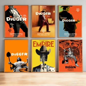 May include: Six framed movie posters for Digger, featuring Tom Cruise in various poses, a blindfolded statue holding a shovel, a person with a shovel head, and a graphic illustration, all with text including Tom Cruise, Digger, and July 13.