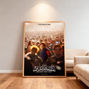 May include: A framed movie poster for "Spider-Man: Brand New Day" with a crowd of people and the main character. The poster has the text "Peter Parker No More" at the top and the release date "July 21, 2026" at the bottom.