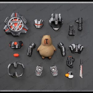 May include: A selection of miniature action figure components and a capybara figurine. The parts include armour pieces, weapons, and a shield, in shades of grey, black, red, and silver. The capybara is tan with a yellow letter "I".