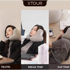 May include: A gray travel pillow is shown in three different settings: travel, break time, and nap time. The pillow is being used by a person in each scene. The pillow has a unique shape and appears to be made of a soft material.