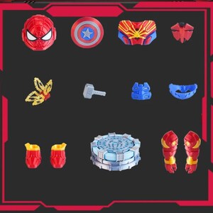 May include: A collection of superhero-themed toys and accessories, including a red Spider-Man mask, Captain America shield, and various armor pieces. The items are arranged on a dark background within a red-lined frame.