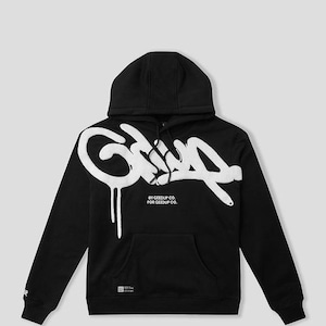 May include: Black hooded sweatshirt with a white graffiti-style design on the front. The design includes the word "Grip" in a stylized font with dripping paint effects. The text "BY GEEDUP CO. FOR GEEDUP CO." is below the main design.