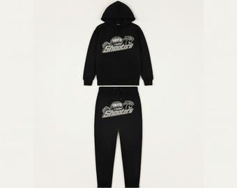 Conjunto de sudadera con capucha y pantalón deportivo Trapstar Shooter negro – Chándal de estilo urbano de primera calidad
