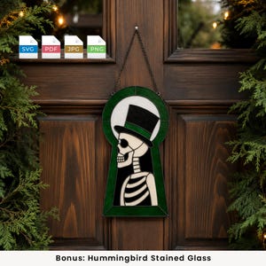 May include: A keyhole-shaped stained glass hanging featuring a skeleton wearing a top hat with a green band. The design is framed in dark green glass with a white circular background. Four file format icons labeled SVG, PDF, JPG, and PNG are visible.