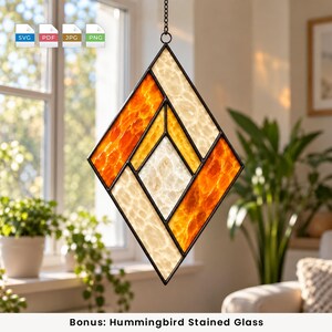 May include: A diamond-shaped stained glass suncatcher featuring a geometric pattern of textured amber and cream-coloured glass panels held together by dark metal cames. The piece hangs from a thin metal chain, displaying a repeating angular design.