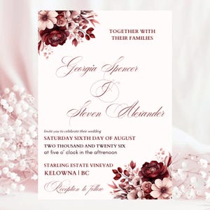 May include: A wedding invitation with burgundy floral accents and elegant script. The invitation includes the names Georgia Spencer and Steven Alexander, along with the wedding date, time, and location.