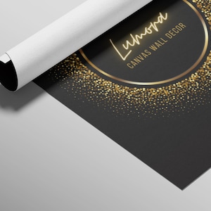 May include: Rolled canvas print featuring the text "Lumora CANVAS WALL DECOR" in gold lettering on a black background. The design includes a gold circle and gold glitter accents. The canvas is partially rolled, revealing a white edge.