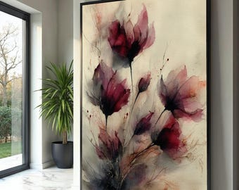 May include: A framed floral art print featuring watercolor-style flowers in shades of burgundy, pink, and purple. The artwork has a soft, ethereal quality, with delicate brushstrokes and a neutral background. The black frame adds a modern touch.