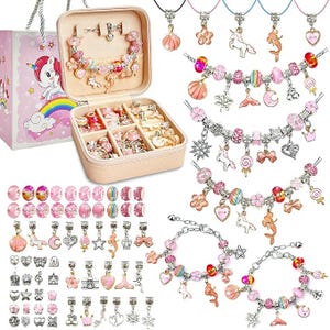 May include: A pink jewelry set for girls, featuring a variety of charms, beads, and bracelets. The set includes a jewelry box, a gift bag with a unicorn, and several bracelets with charms like unicorns, shells, and flowers.