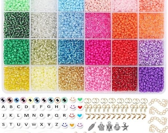 May include: A craft kit with a variety of colorful beads in a clear divided container. Includes letter beads, smiley face beads, charms, elastic string, crystal string, and tweezers. The beads are in shades of green, blue, pink, orange, and purple.