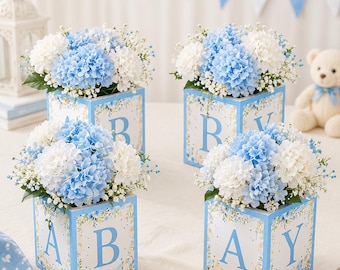 Cajas de flores para baby shower: Centros de mesa florales azules