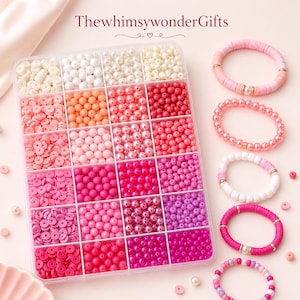 May include: A clear plastic organizer box filled with various pink, white, and peach-colored beads in different shapes and finishes, including round and flat disc styles. Five finished bracelets are displayed next to the box. Text reads ThewhimsywonderGifts.