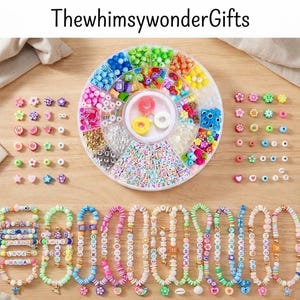 May include: A circular plastic organizer container filled with assorted colorful beads, including letter cubes, fruit shapes, and flowers. Below the container are twelve beaded bracelets with various charms and letter beads. The text ThewhimsywonderGifts is visible.