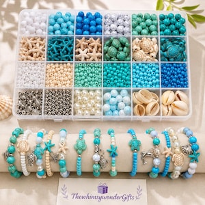 May include: A clear plastic organizer filled with various beads in shades of blue, white, and beige, including starfish, turtles, and shells. Below are several beaded bracelets with sea-themed charms. The text on the card reads "ThewhimsywonderGifts".
