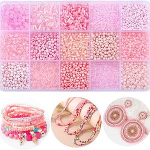 May include: A clear plastic organizer filled with various shades of pink beads, alongside several beaded bracelets, necklaces, and earrings. The beads are in different shapes and sizes, perfect for jewelry making. The bracelets and necklaces feature pink and colorful beads.