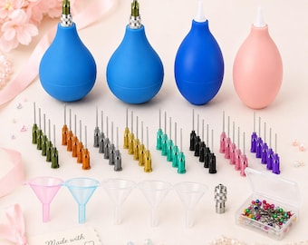 May include: A set of four squeeze bulbs with metal tips, multiple sets of colored needle tips, five clear plastic funnels, a metal adapter, and a small clear box filled with multicolored sewing pins. The text "Made with Joy" is visible.