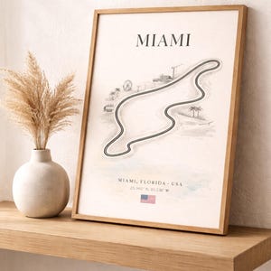 May include: A set of three ceramic mugs with a speckled, matte finish. The mugs are in shades of cream, light gray, and dark gray. Each mug has a simple, minimalist design, perfect for coffee or tea.