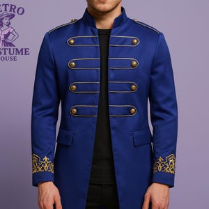 May include: A royal blue military-style jacket with gold trim and buttons. The jacket features decorative gold embroidery on the cuffs and is from Retro Costume House.